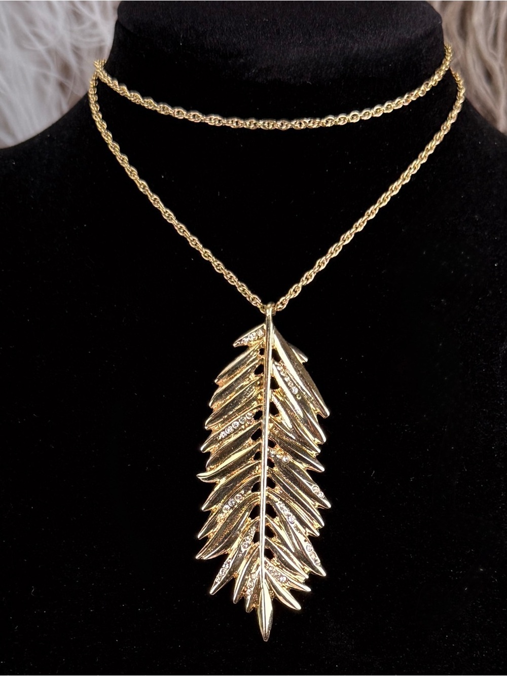 Gold Tone Feather Pendant Necklace with Clear Rhinestone Accents